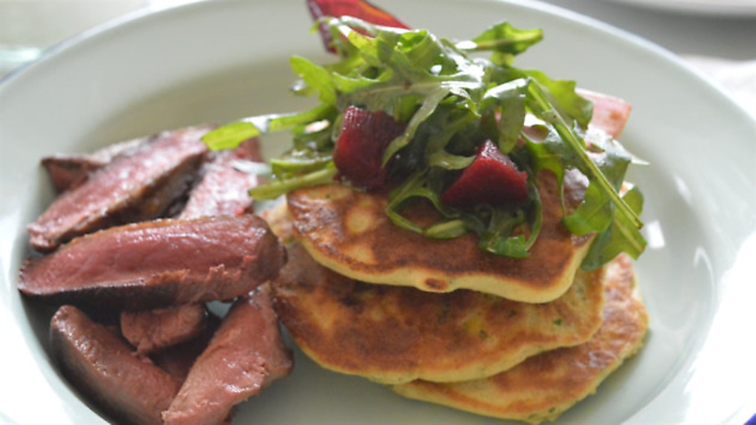 Pan fried pigeon with sweetcorn fritters and beetroot salad