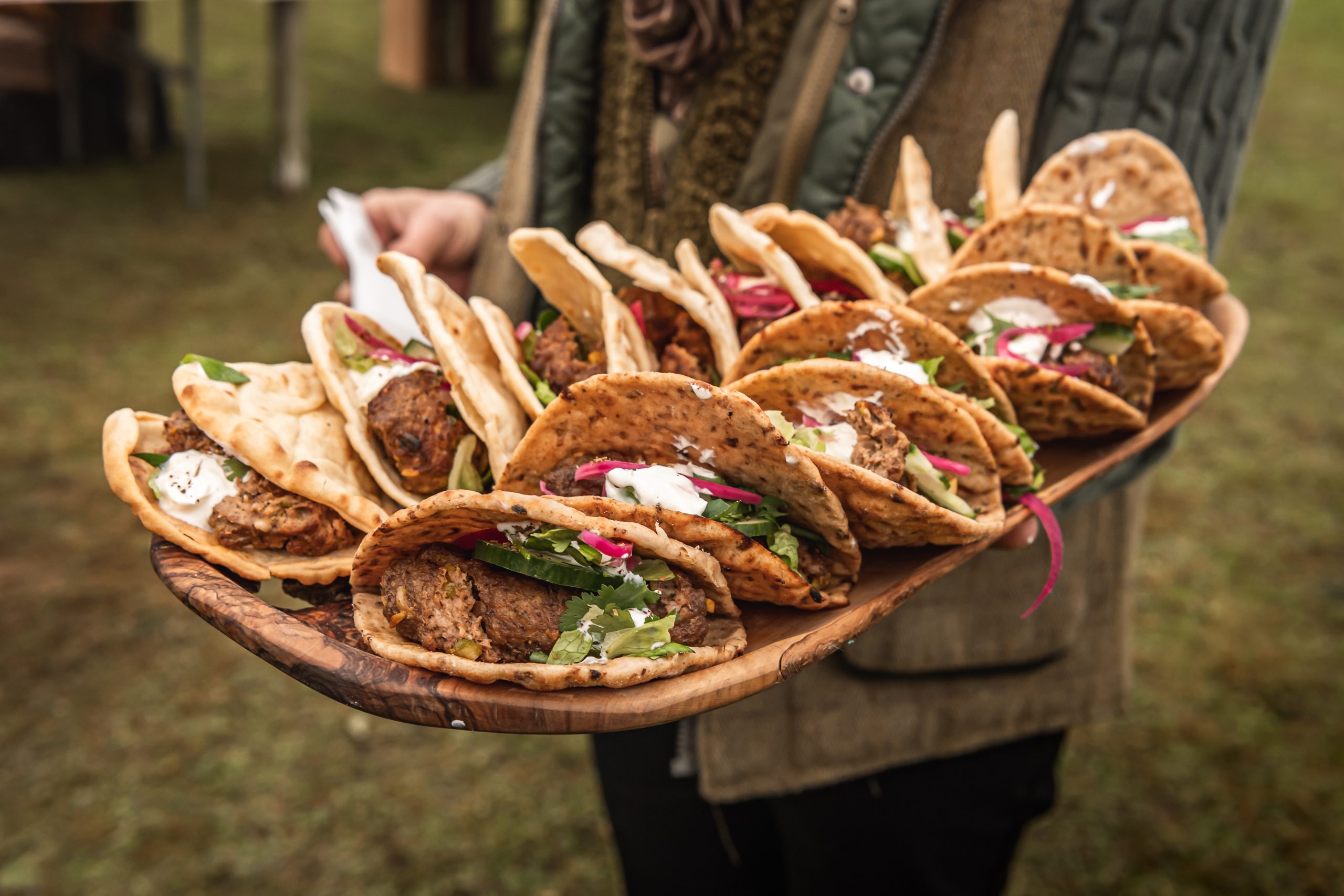 A tray of game tacos presented on a shoot day