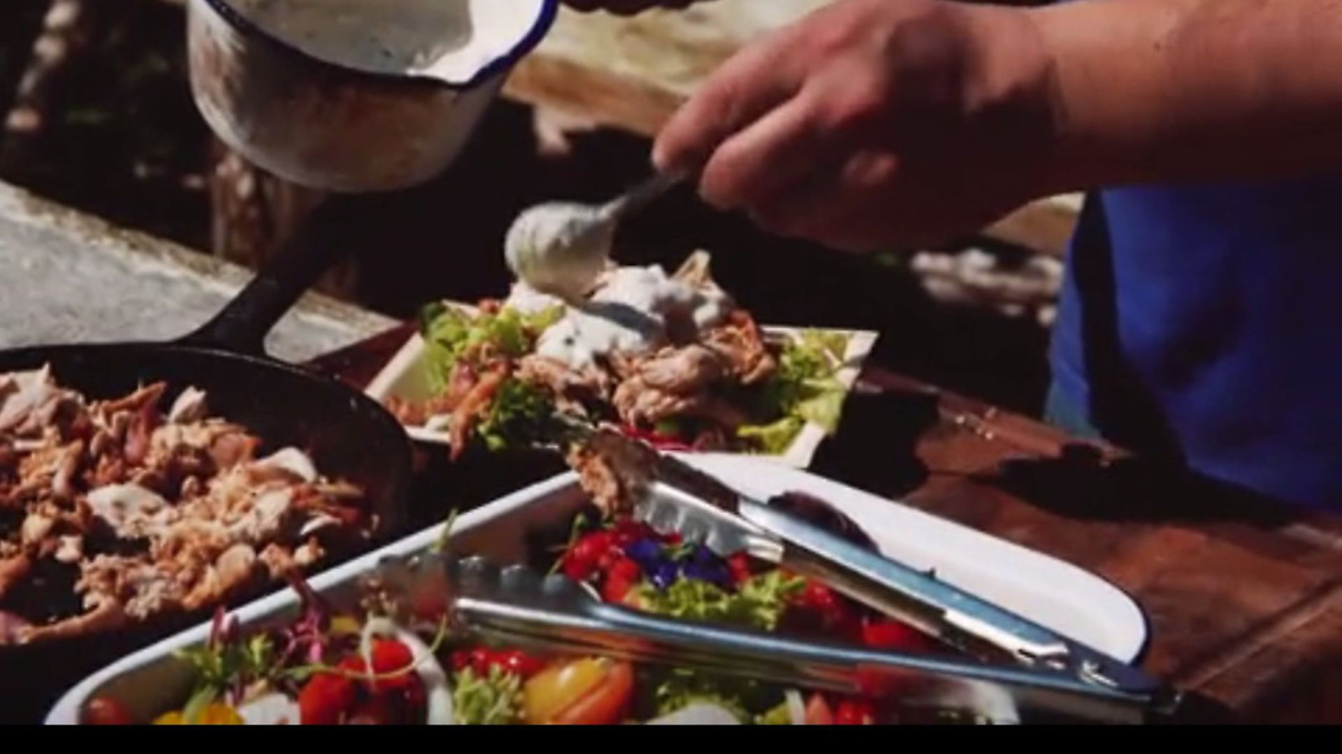 Pulled rabbit salad being cooked