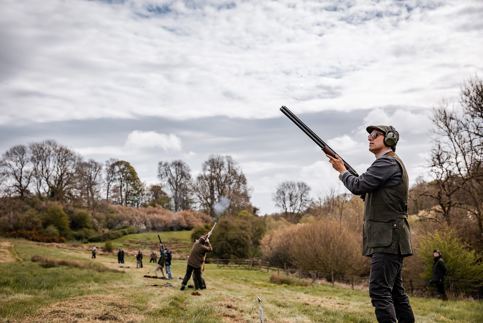A Gun shoots clays in a Cotswold valley during a simulated game day at Great Tew Estate