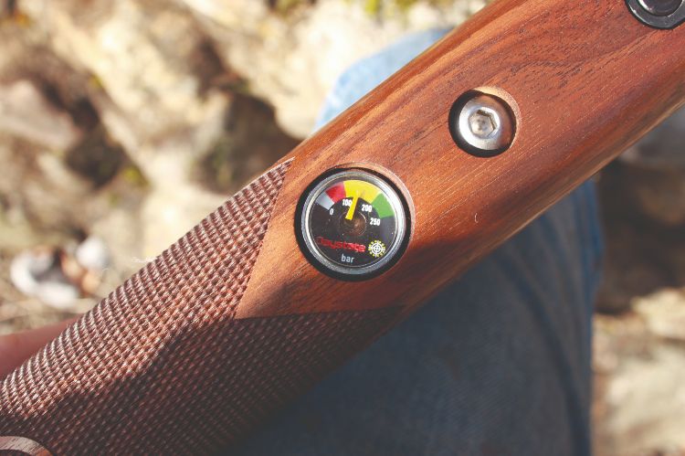 A pressure gauge on an air rifle